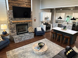 Smart TV, fireplace, foosball