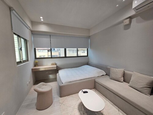 Xinyi 53 - Stylish Modern Suite in the Heart of the City