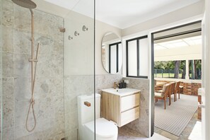Shower, hair dryer, towels, soap