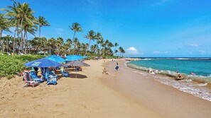 On the beach, sun loungers, beach towels