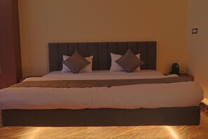 Chambre Deluxe | Draps en coton égyptien, literie de qualité, bureau