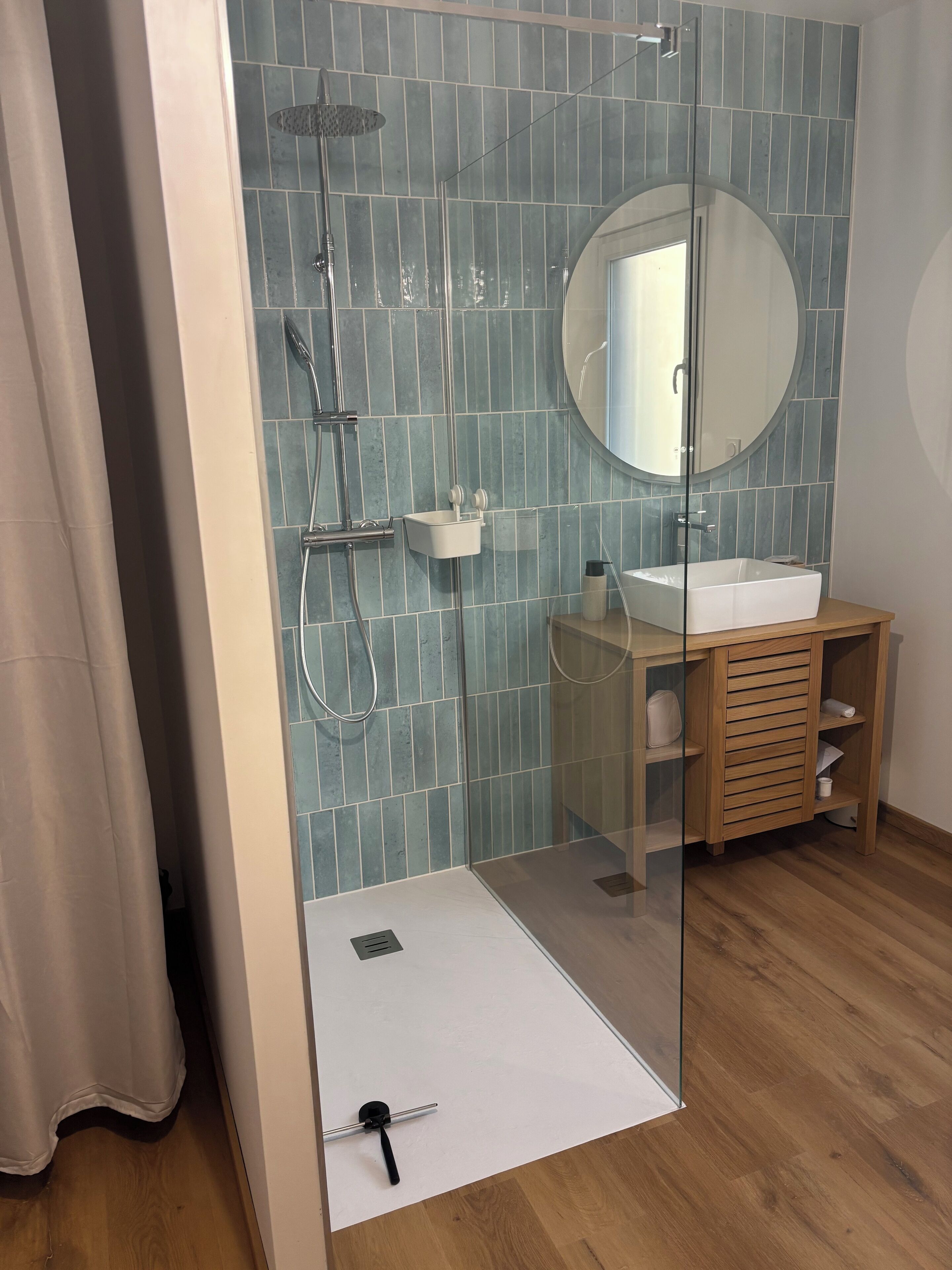 Shower, hair dryer, towels, toilet paper