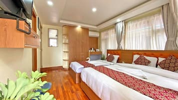 Habitación Deluxe con 1 cama matrimonial o 2 individuales, vista a la ciudad | Wifi gratis