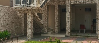 Cozy Guest Room in Kinshasa with Balcony and Partial Air-Conditioning