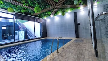 Indoor pool, seasonal outdoor pool, pool loungers