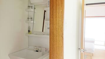 Hair dryer, bidet, towels, soap