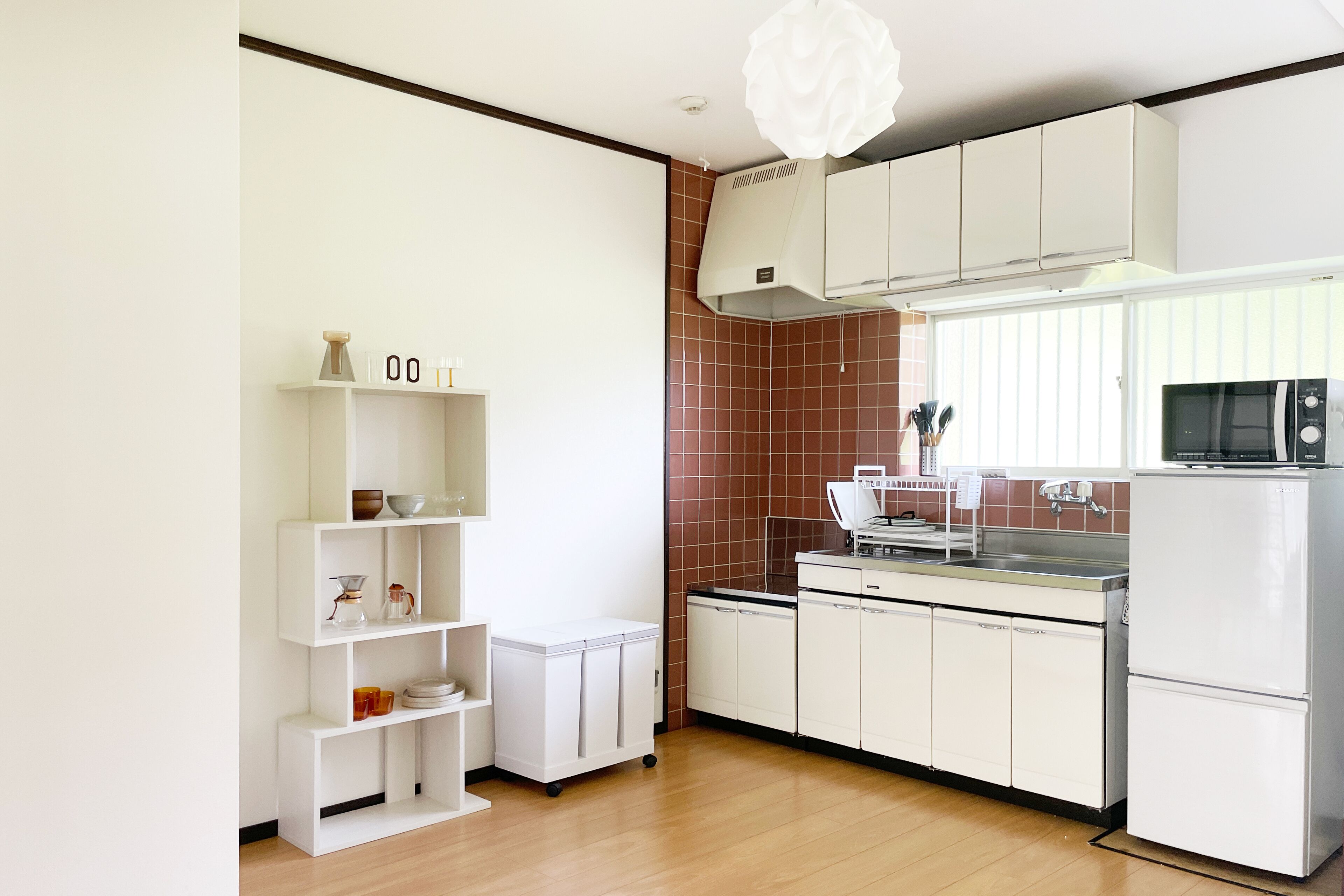 Fridge, microwave, stovetop, coffee/tea maker