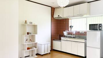 Fridge, microwave, stovetop, coffee/tea maker