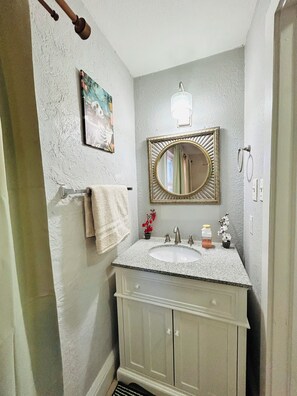 Hair dryer, towels, soap, toilet paper
