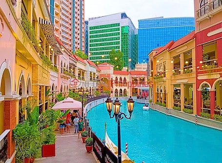 Shopping mall. Live Luxury Living at BGC Venice