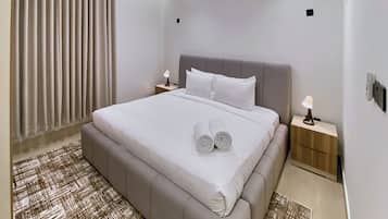 Departamento Premium, patio | Ropa de cama de alta calidad y caja de seguridad en la habitación