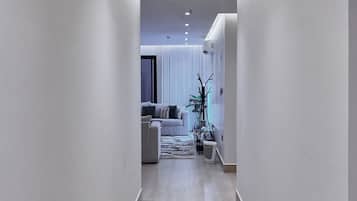 Departamento Premium, patio | Ropa de cama de alta calidad y caja de seguridad en la habitación