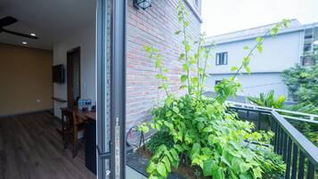 Deluxe-dobbeltværelse - 1 soveværelse - byudsigt | Terrasse/gårdhave