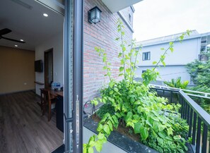 Quarto casal luxo, 1 quarto, vista para a cidade | Terraço/pátio