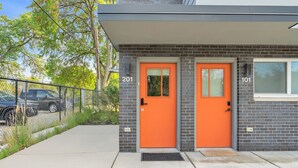 A building with two doors, each marked with a number. - Opulent Birmingham Retreat (Birmingham)