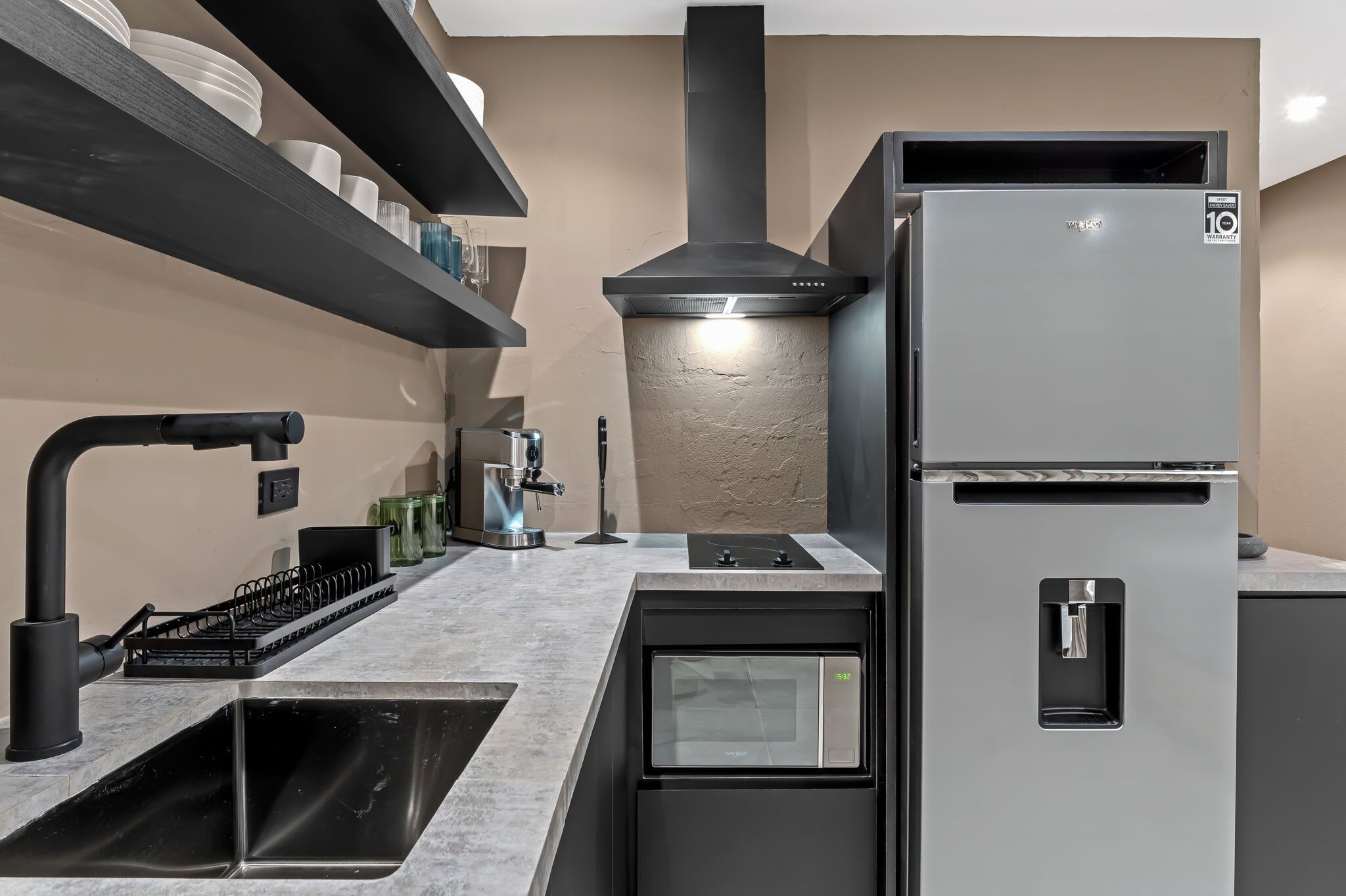 Fridge, microwave, stovetop, coffee/tea maker