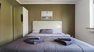 1 habitación, tabla de planchar con plancha, wifi y ropa de cama