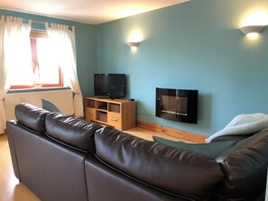 Una Smart TV, una chimenea