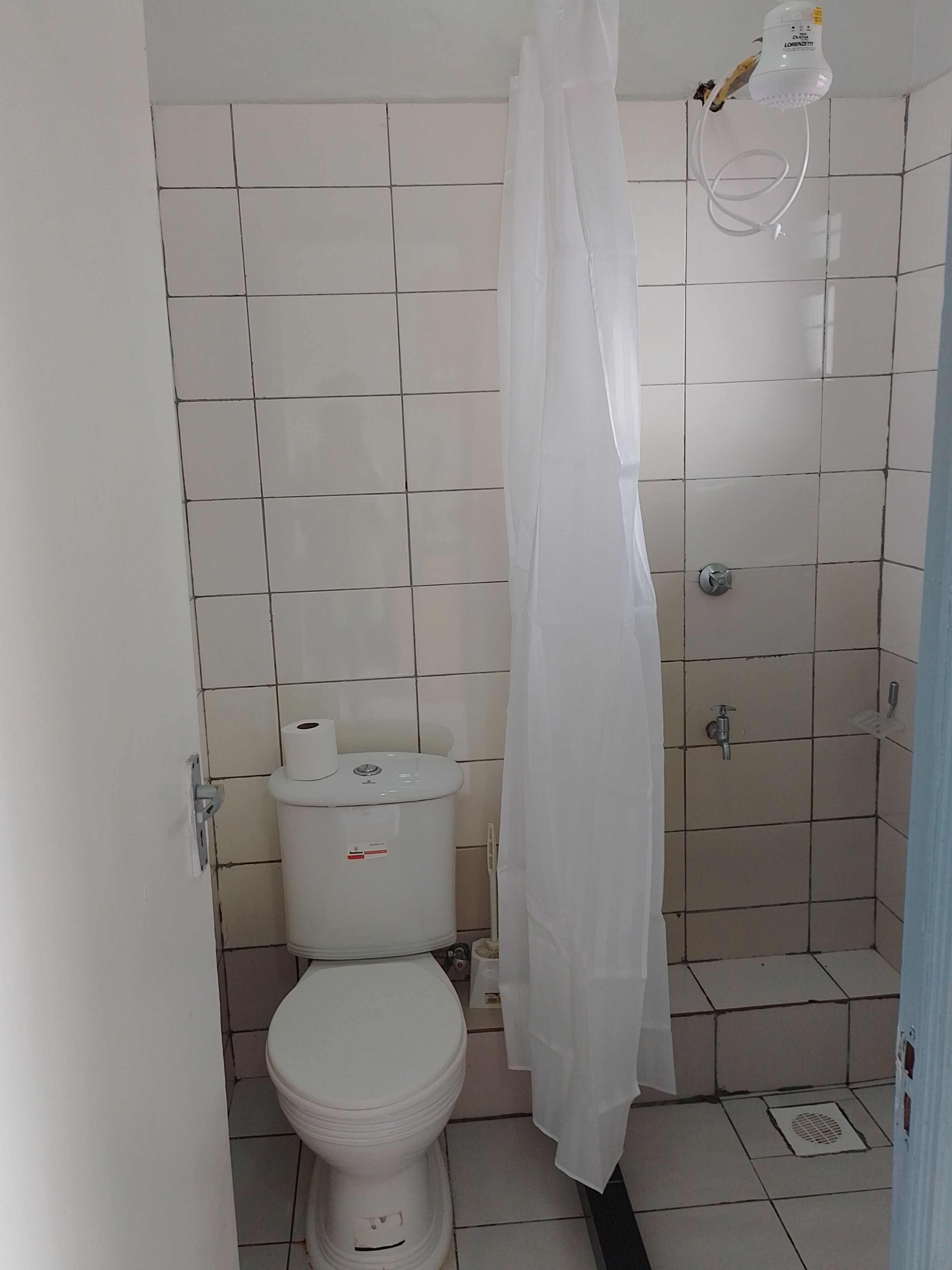 Shower, towels, soap, toilet paper