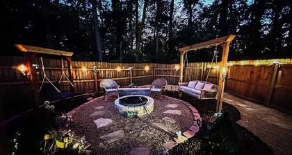 Private Urban Oasis with heated pool spa, outdoor bar and TV, firepit, corn hole