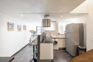 Apartment | Private kitchen | Fridge, oven, stovetop, dishwasher
