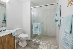 Hair dryer, towels, soap, shampoo