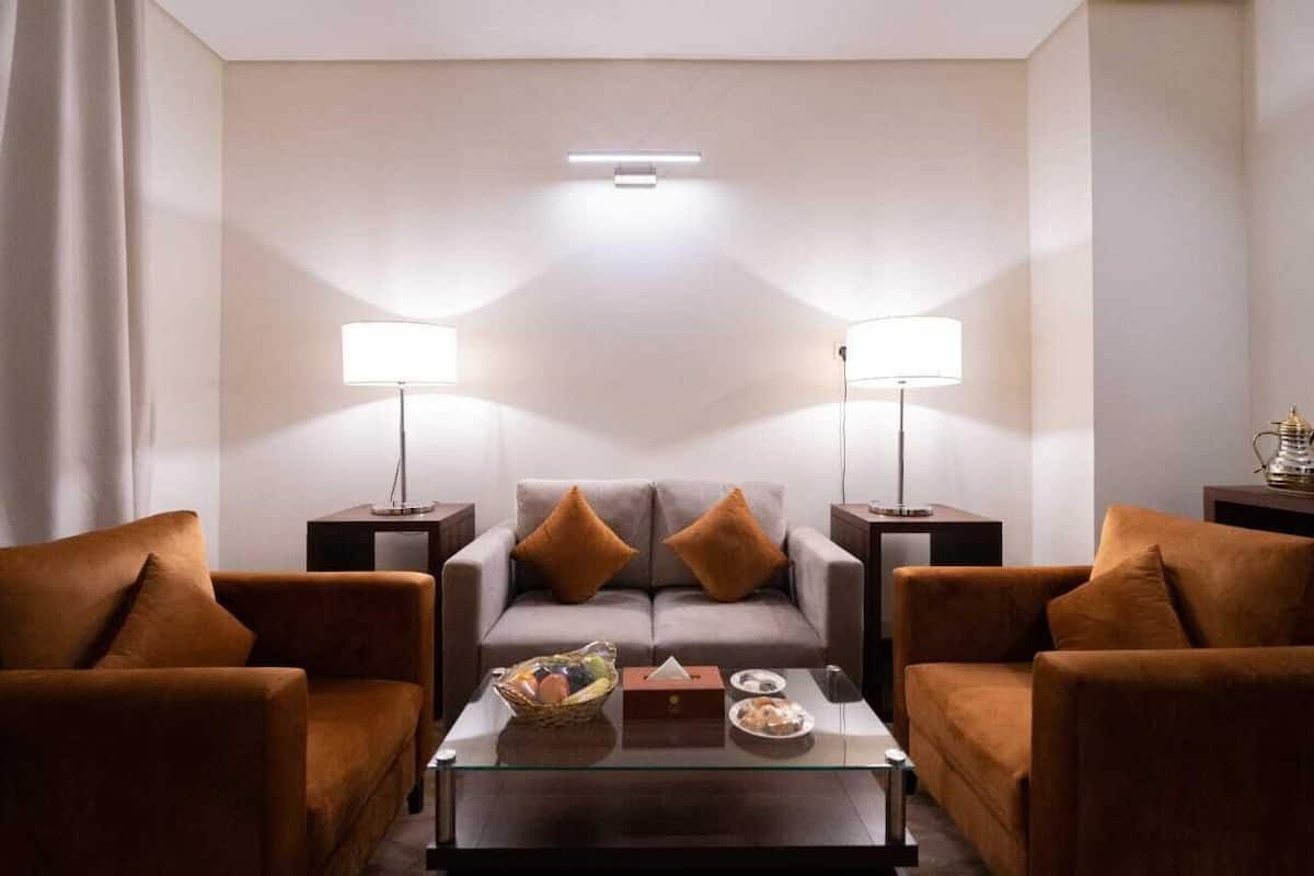 Deluxe Suite, City View | In-room safe, blackout drapes, soundproofing, iron/ironing board