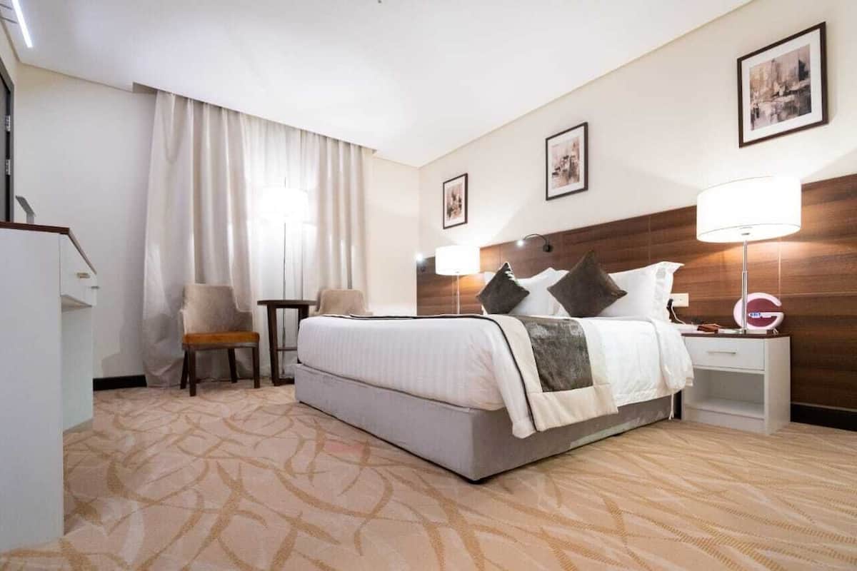 Deluxe Studio Suite, City View | In-room safe, blackout drapes, soundproofing, iron/ironing board