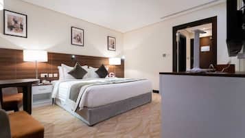 Family Room, 2 Bedrooms | Minibar, in-room safe, blackout curtains, soundproofing