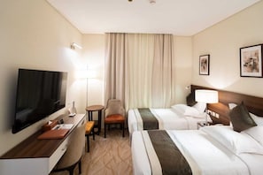 Deluxe Double Room, City View | In-room safe, blackout drapes, soundproofing, iron/ironing board