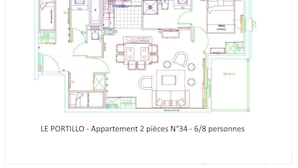 A floor plan of an apartment with 2 bedrooms, a living room, a kitchen, and a bathroom.