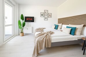 2 habitaciones, tabla de planchar con plancha, wifi y ropa de cama
