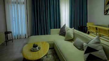 Deluxe Apartment, Balcony | Living area