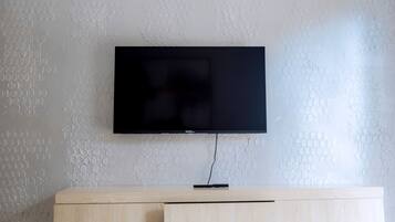 Deluxe Apartment, Balcony | Living area