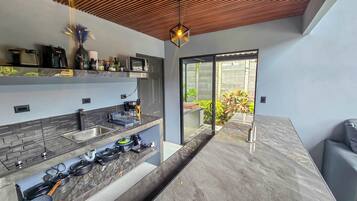 Fridge, microwave, stovetop, coffee/tea maker