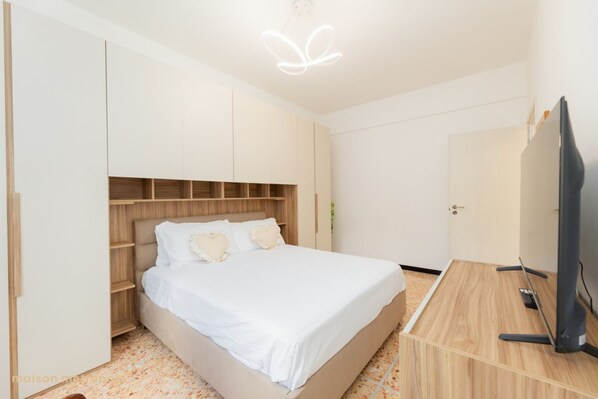 2 chambres, fer et planche à repasser