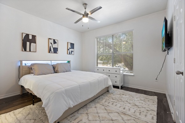 Luxury queen bedroom with plush bedding, soft pillows, and an inviting ambiance