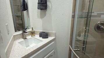 Hair dryer, towels, soap, shampoo