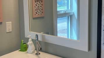 Hair dryer, towels, soap, shampoo