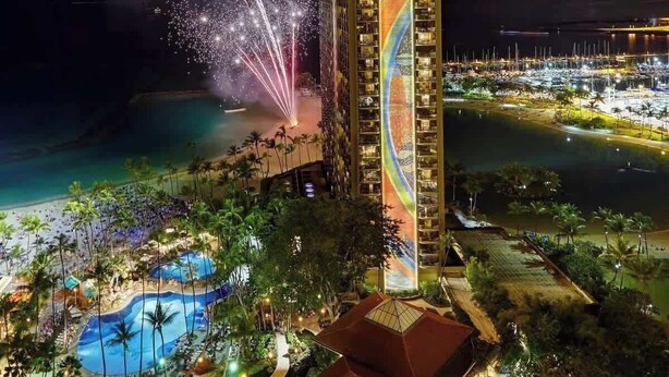 A hotel with a pool, surrounded by a beach and palm trees. - Waikiki Ocean View Studio, 3 Beds, Block to Beach (Honolulu)
