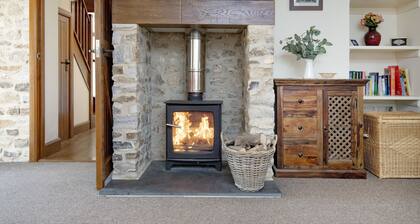The Old Shippon at Bucknole Farm is a charming stone and slate barn conversion