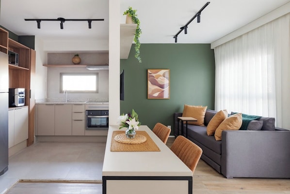 Comfort Apartment, City View | Living area | Flat-screen TV