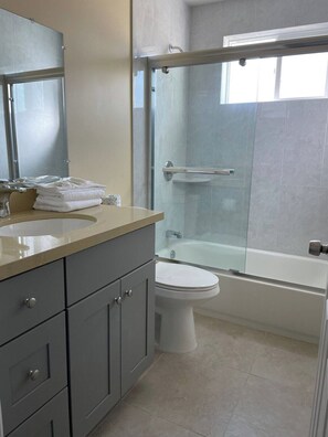 Hair dryer, towels, soap, toilet paper