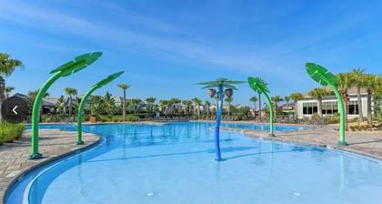 Spacious 4-bed townhome with AC. Beautiful resort style pool and fitness center