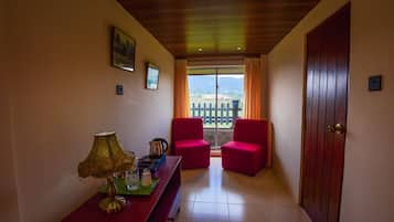 Deluxe Double Room, Hill View | In-room safe, desk, laptop workspace, iron/ironing board