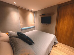 Estudio Deluxe, 1 cama Queen size | Minibar, caja de seguridad en la habitación y escritorio 