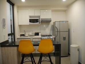 Fridge, microwave, oven, stovetop