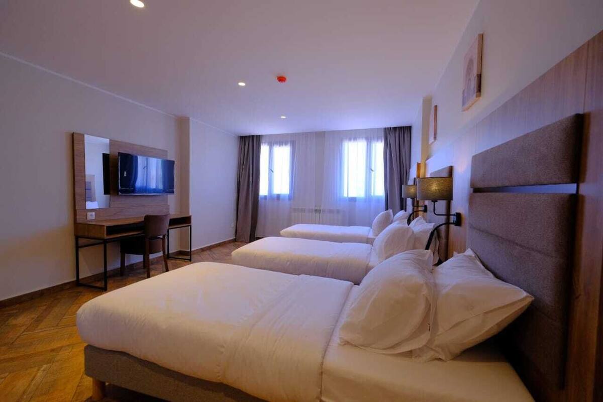 Family Apartment | In-room safe, desk, laptop workspace, blackout curtains