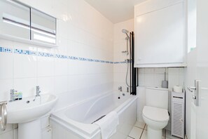 Hair dryer, towels, soap, toilet paper