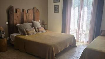 Desk, laptop workspace, blackout drapes, iron/ironing board